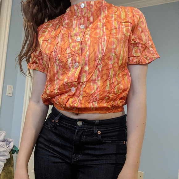 Orange Printed Potli Button Crop Shirt